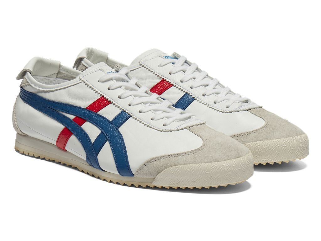 Onitsuka Tiger Mexico 66 NM in white leather with blue and red Tiger stripes, a beige suede toe and heel, and an off-white sole
