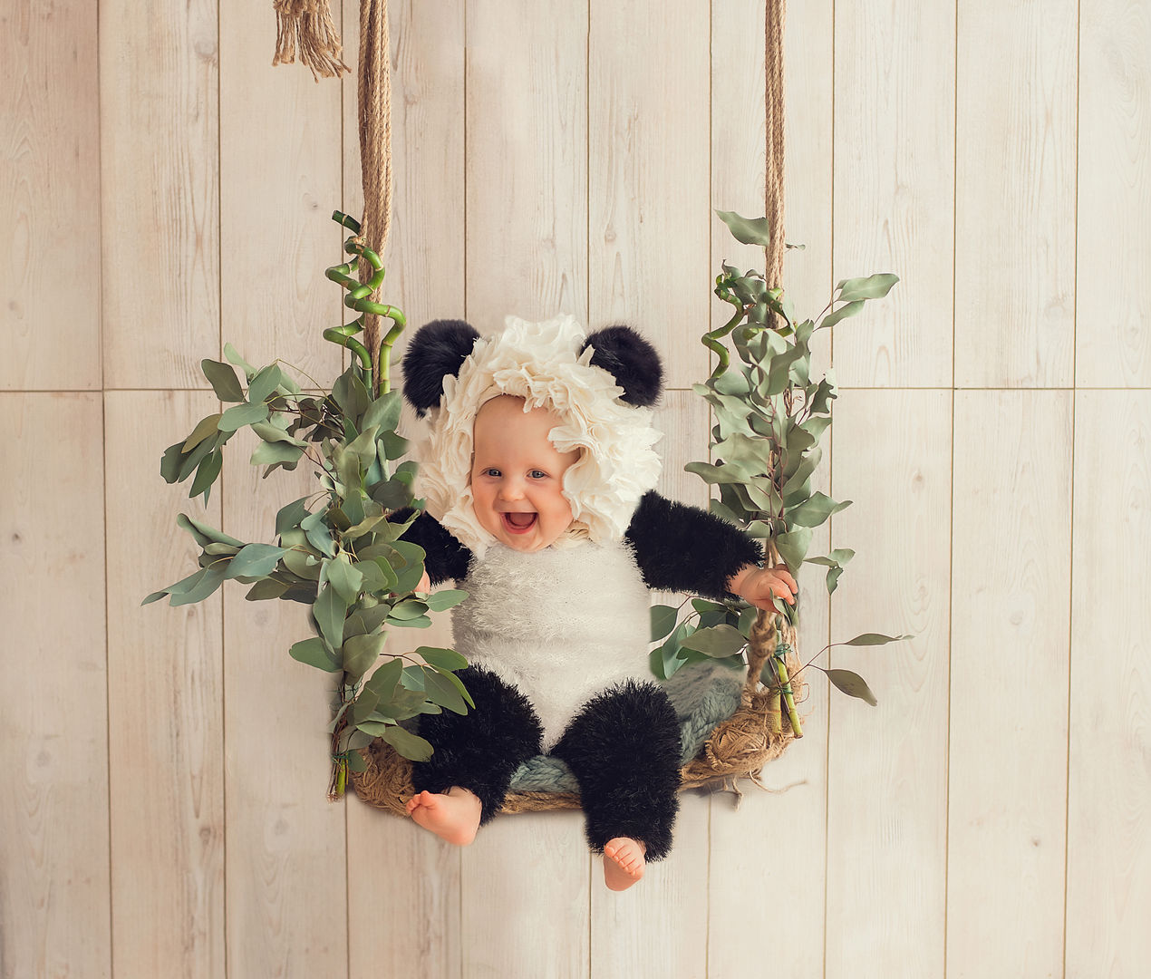 Playful cake smash milestone portrait