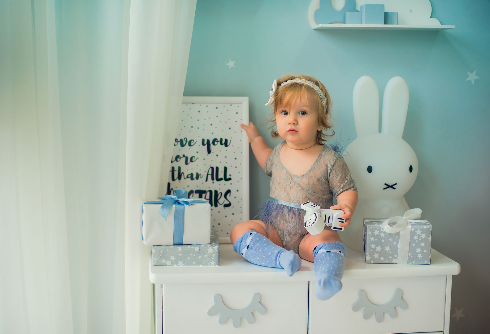 Playful cake smash milestone moment