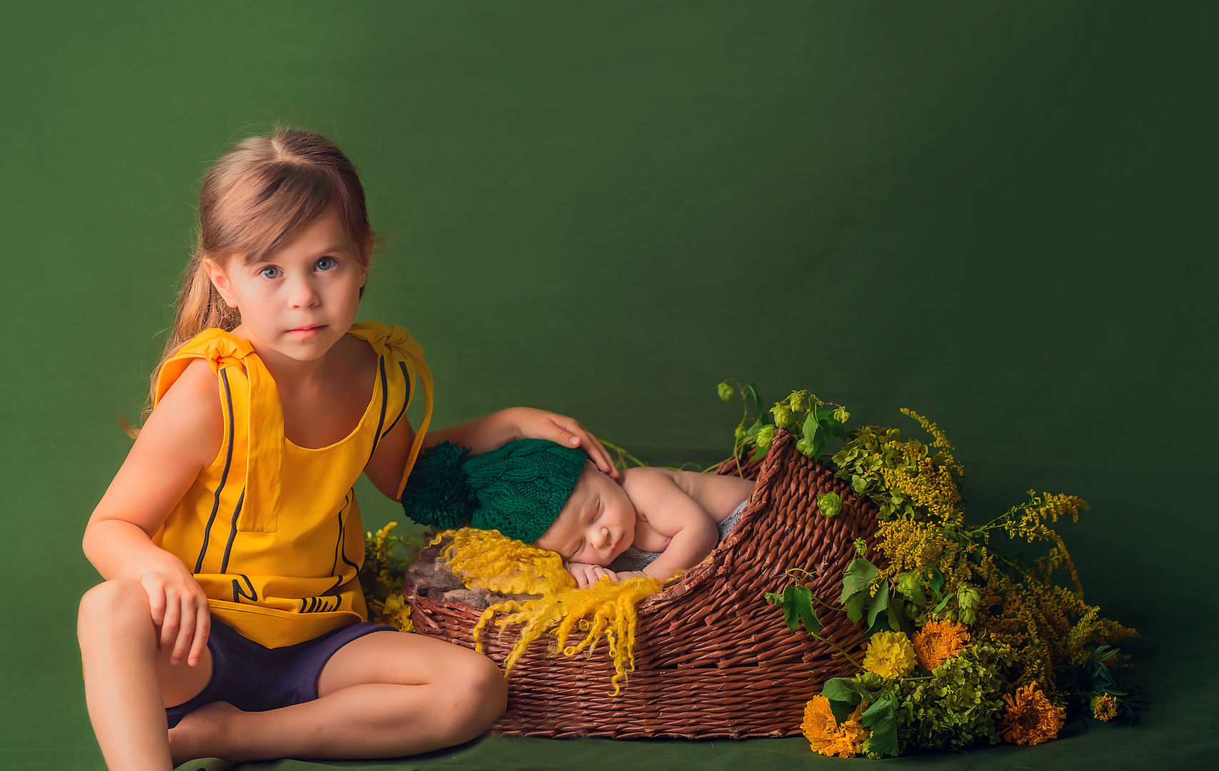 Newborn baby in posed composition - styled baby portrait Los Angeles