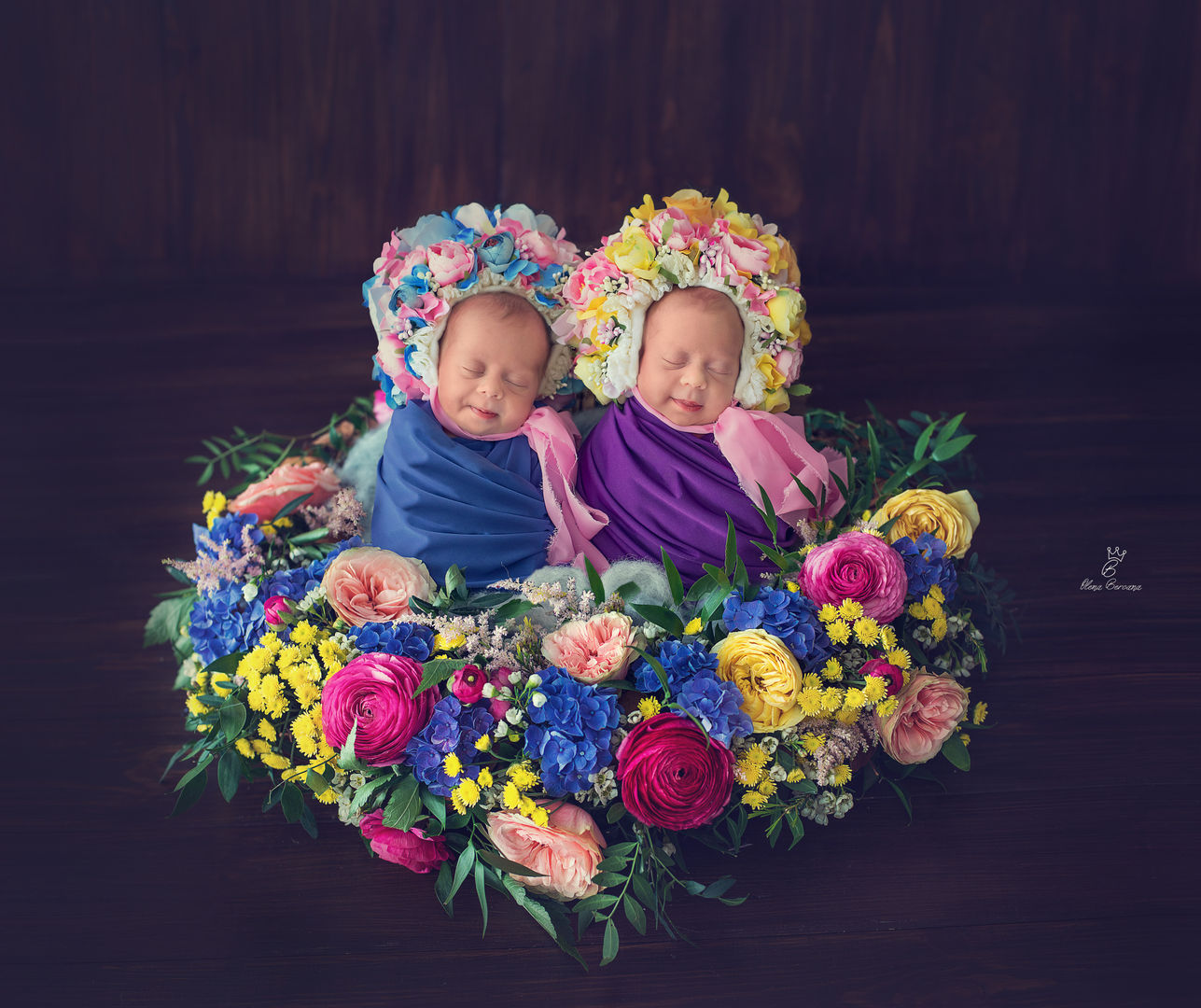 Newborn baby with floral crown - artistic baby photography