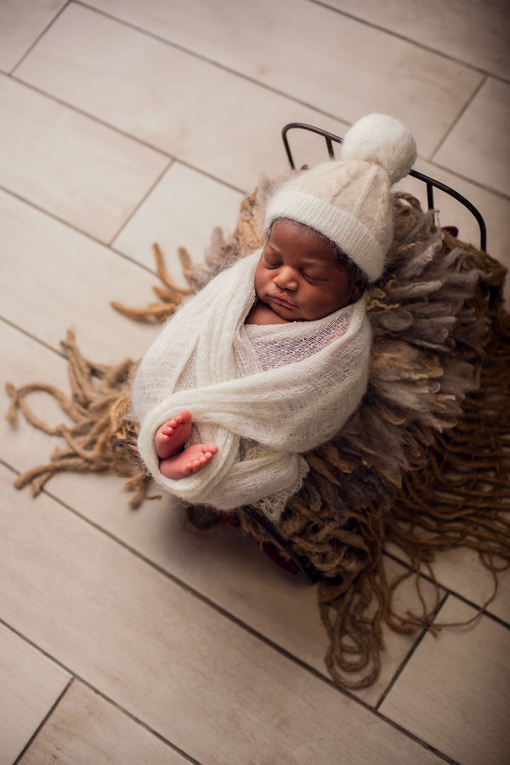 Newborn with floral accents - styled baby photography Los Angeles