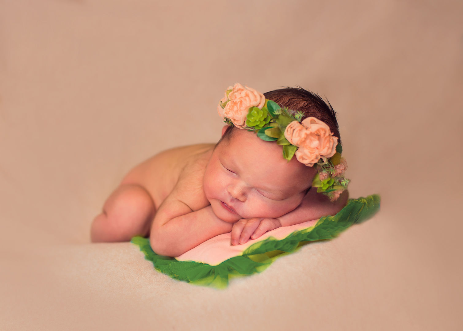 Sleeping newborn baby in basket - classic newborn photography