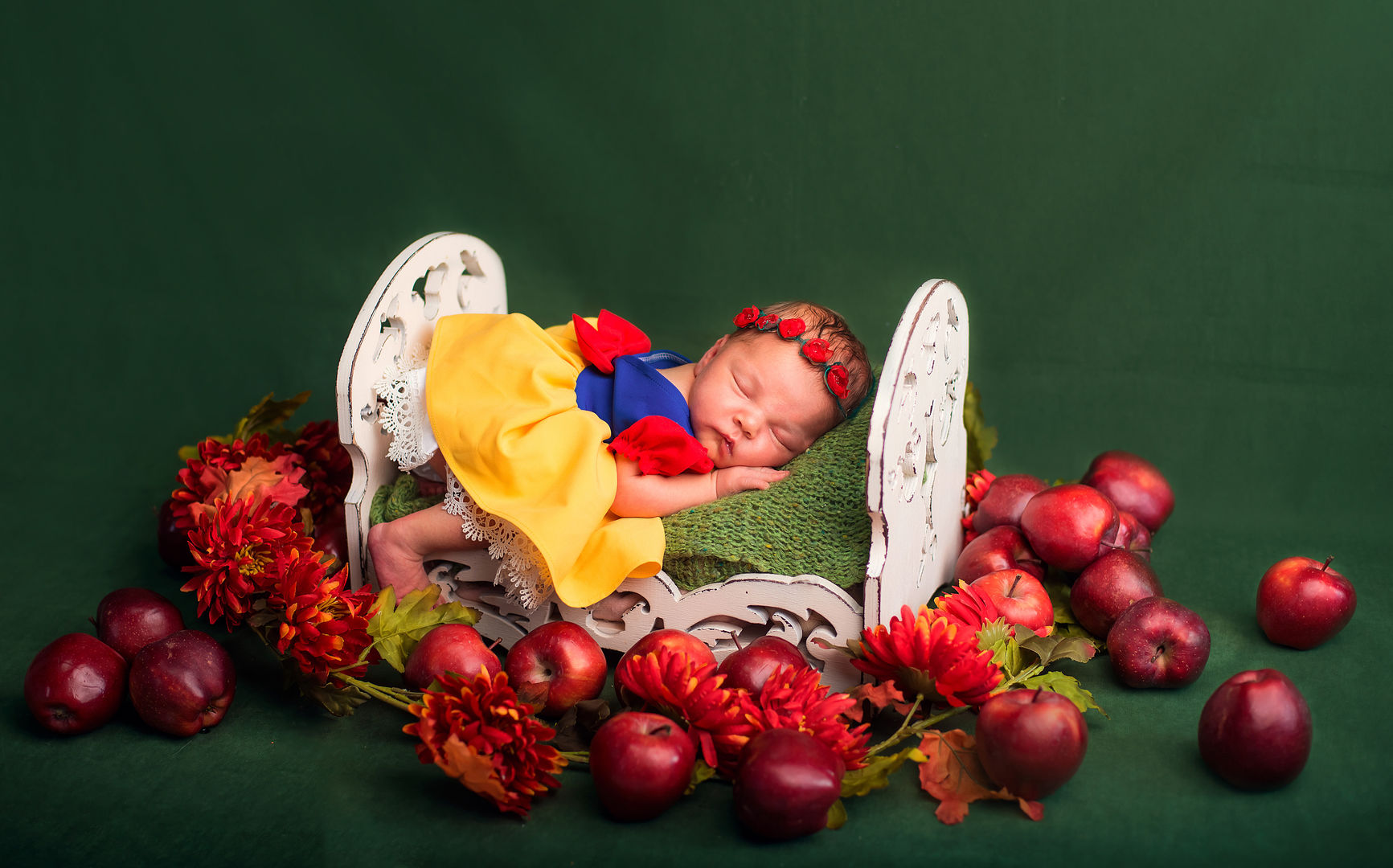 Newborn in basket with props - styled baby photography
