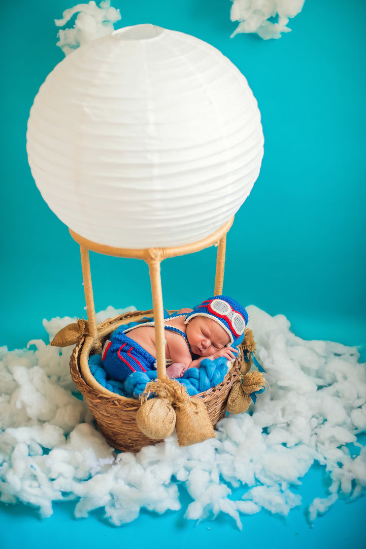Sleeping newborn in basket - styled photography Los Angeles