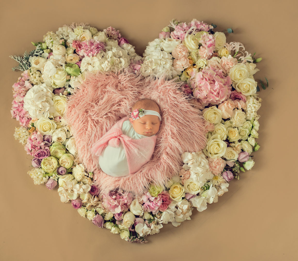 Classic newborn portrait with soft props - styled baby photography