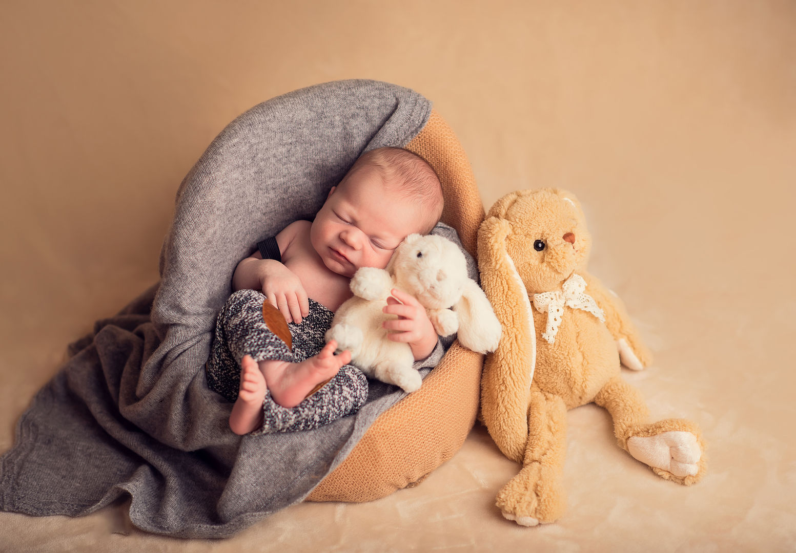 Newborn with stuffed animals - artistic baby portrait Los Angeles