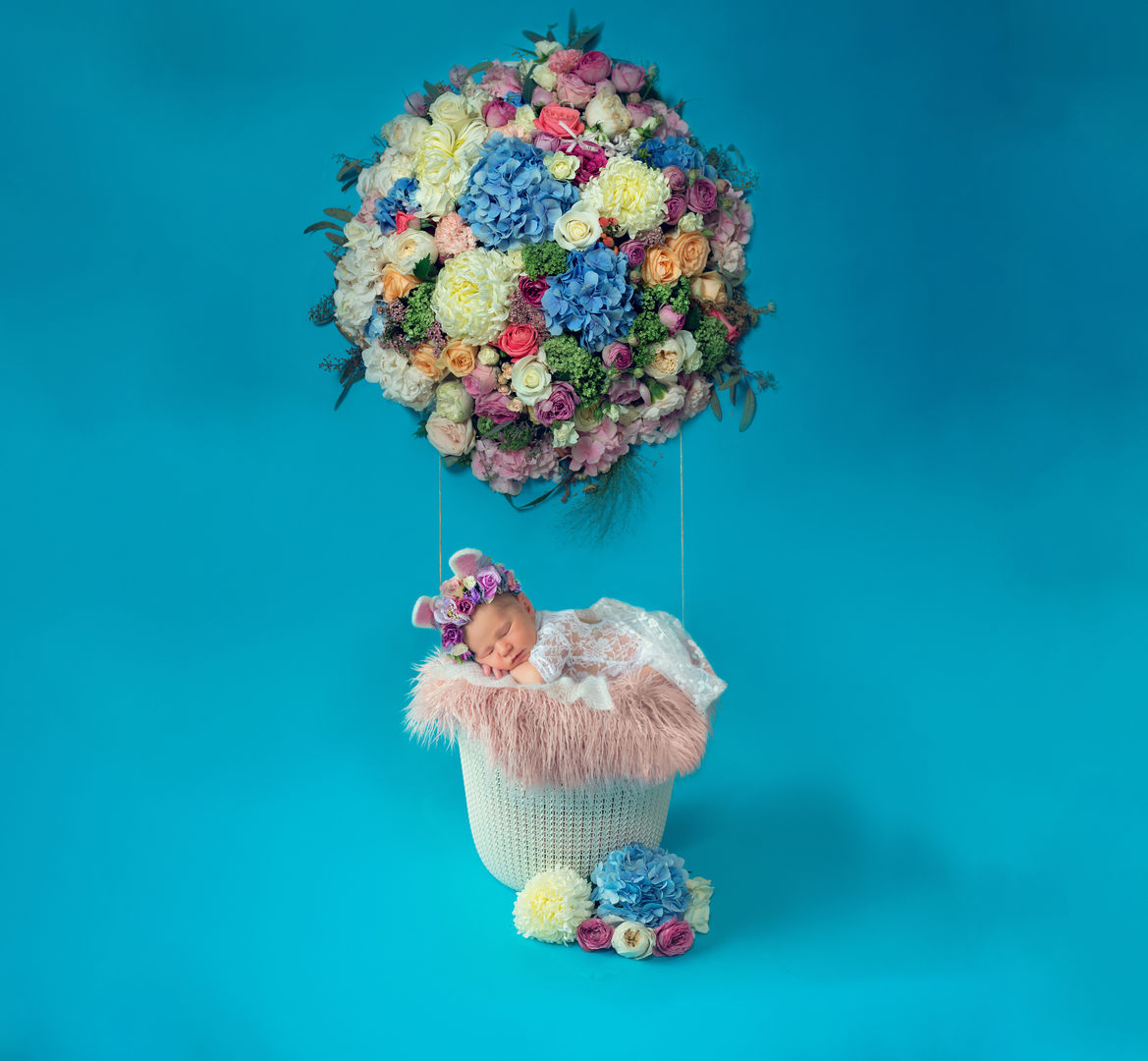 Styled newborn baby in basket - classic photography Los Angeles