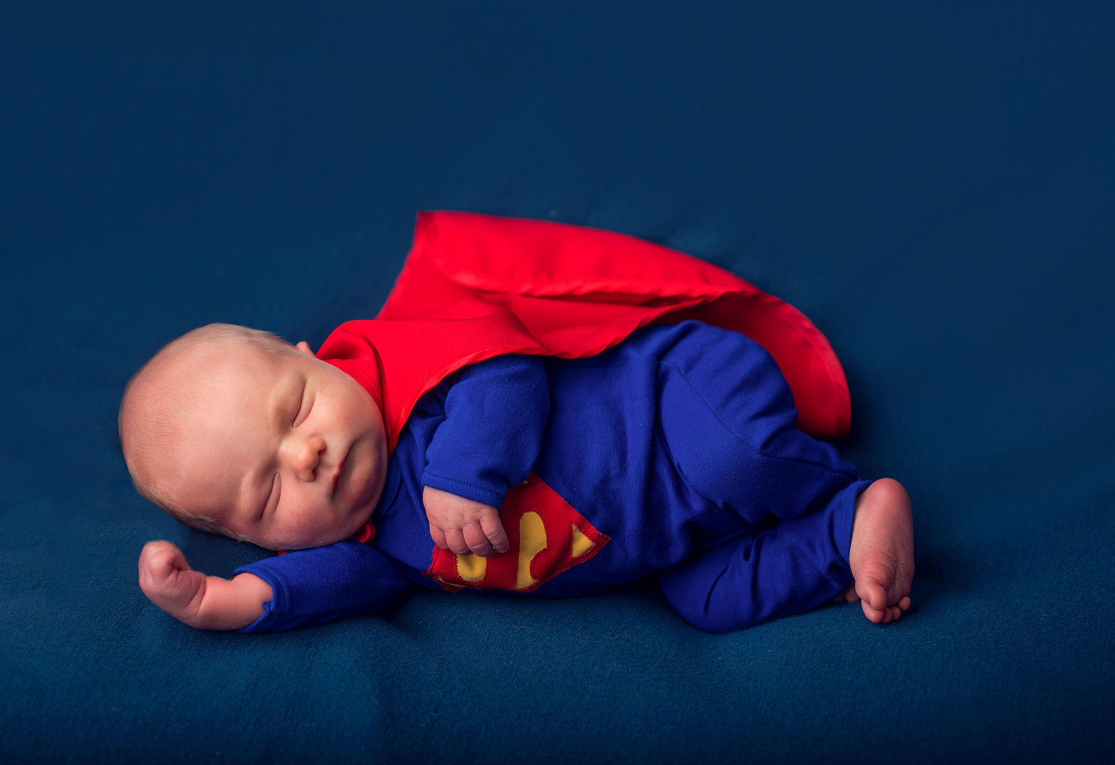 Sleeping newborn in dreamy setting - artistic photography Los Angeles