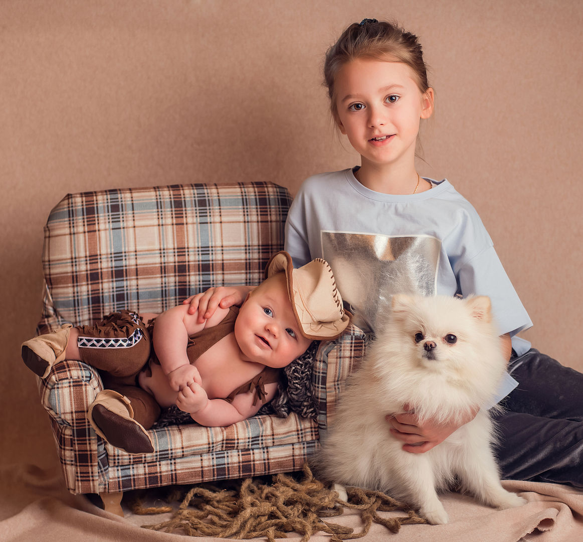 Posed newborn with props - styled baby photography