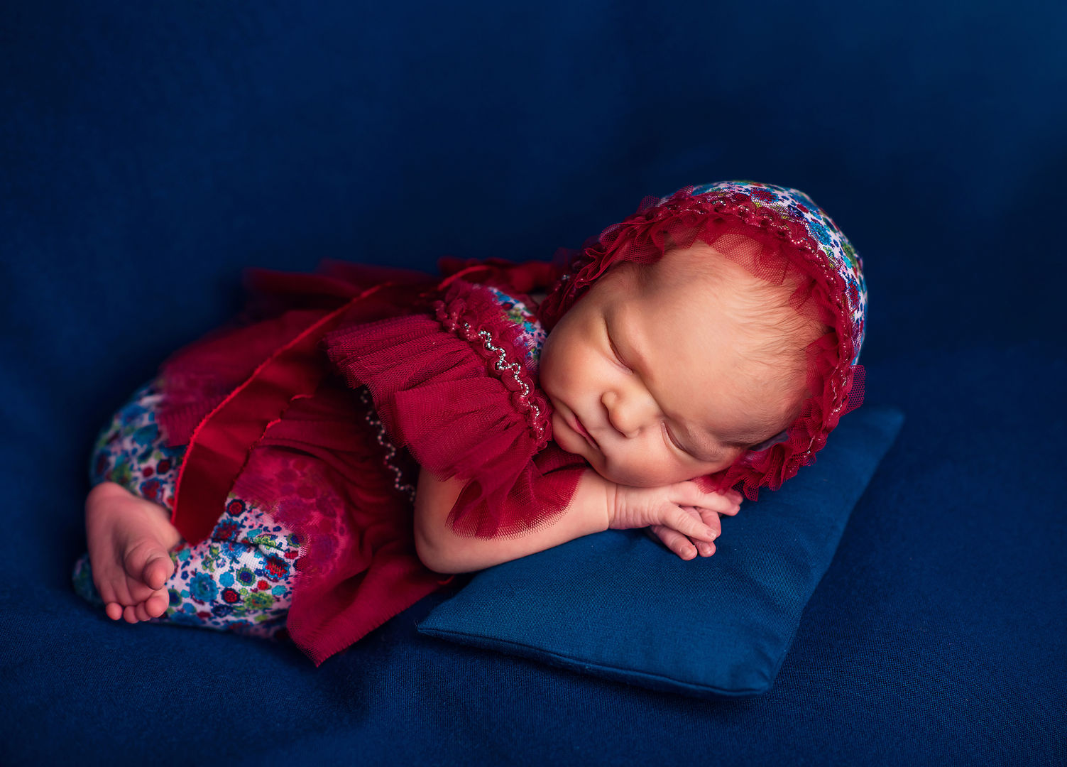 Newborn with props and floral crown - artistic photography Los Angeles