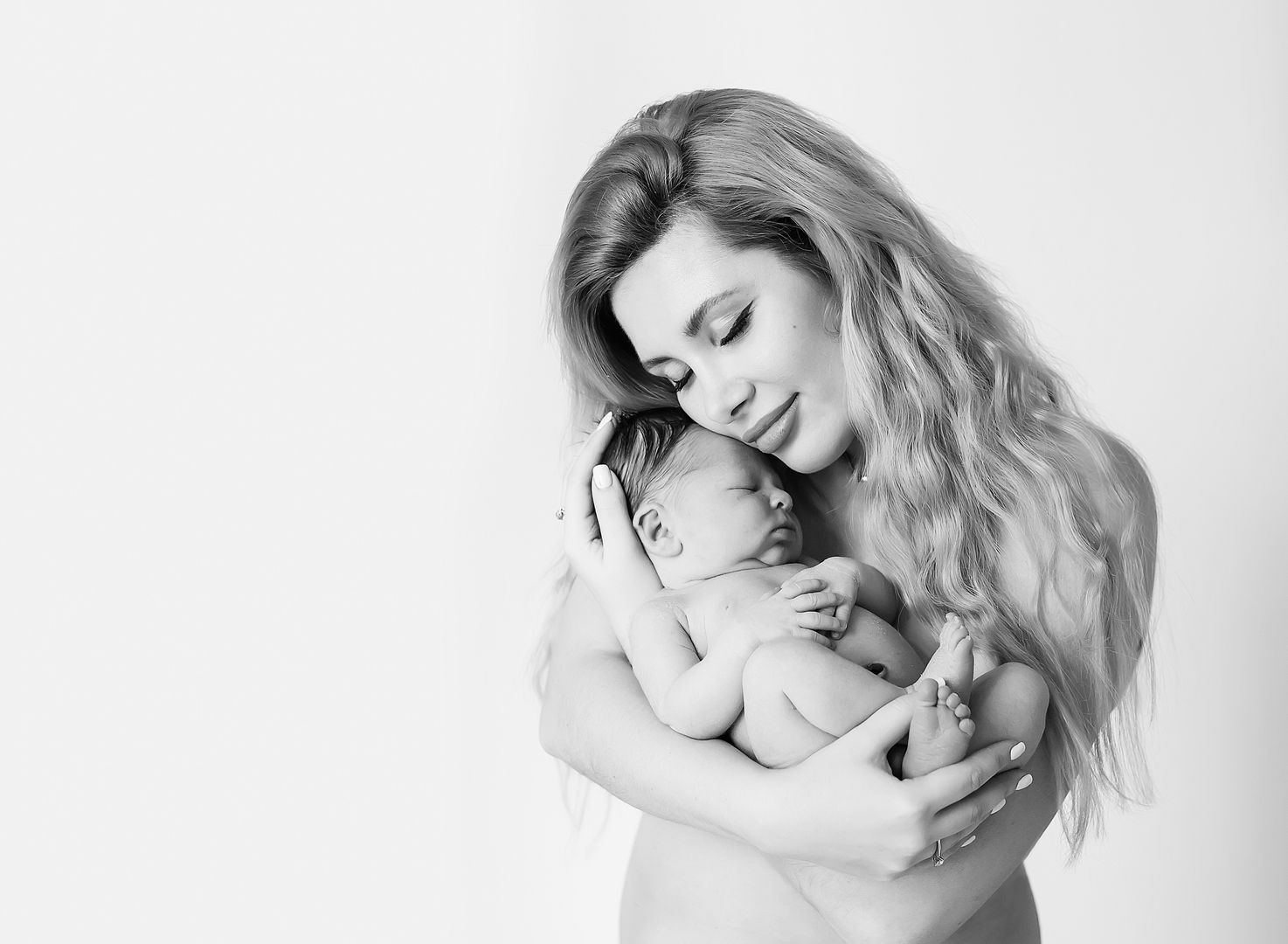 Tender newborn lifestyle family portrait