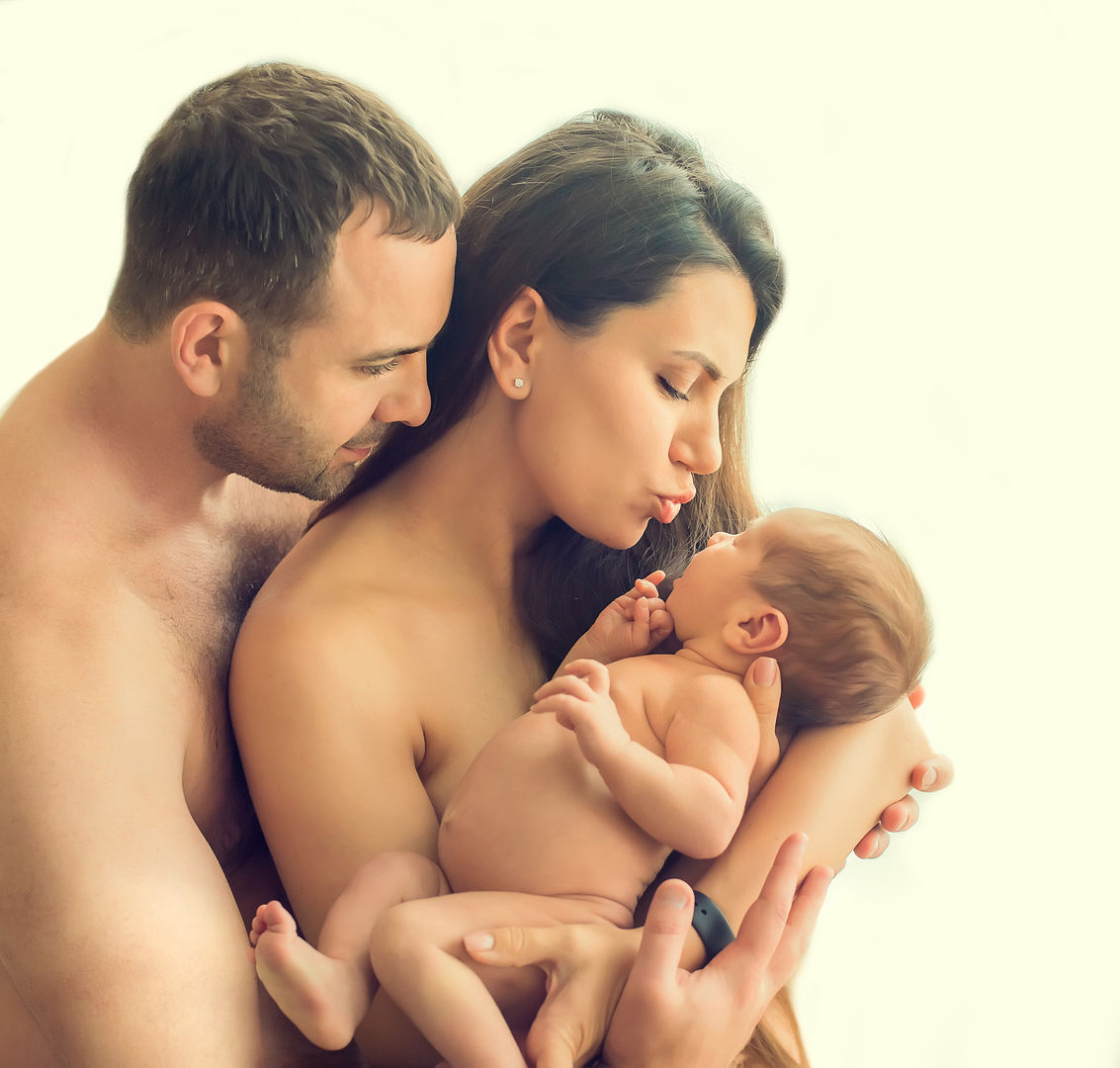 Tender newborn lifestyle moment captured beautifully