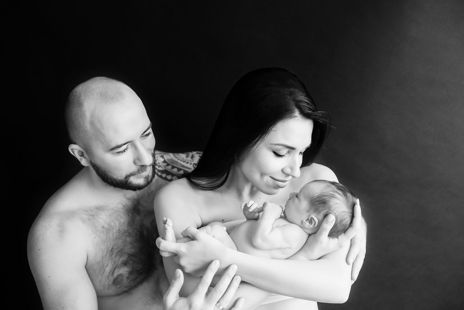 Intimate newborn lifestyle moment captured beautifully