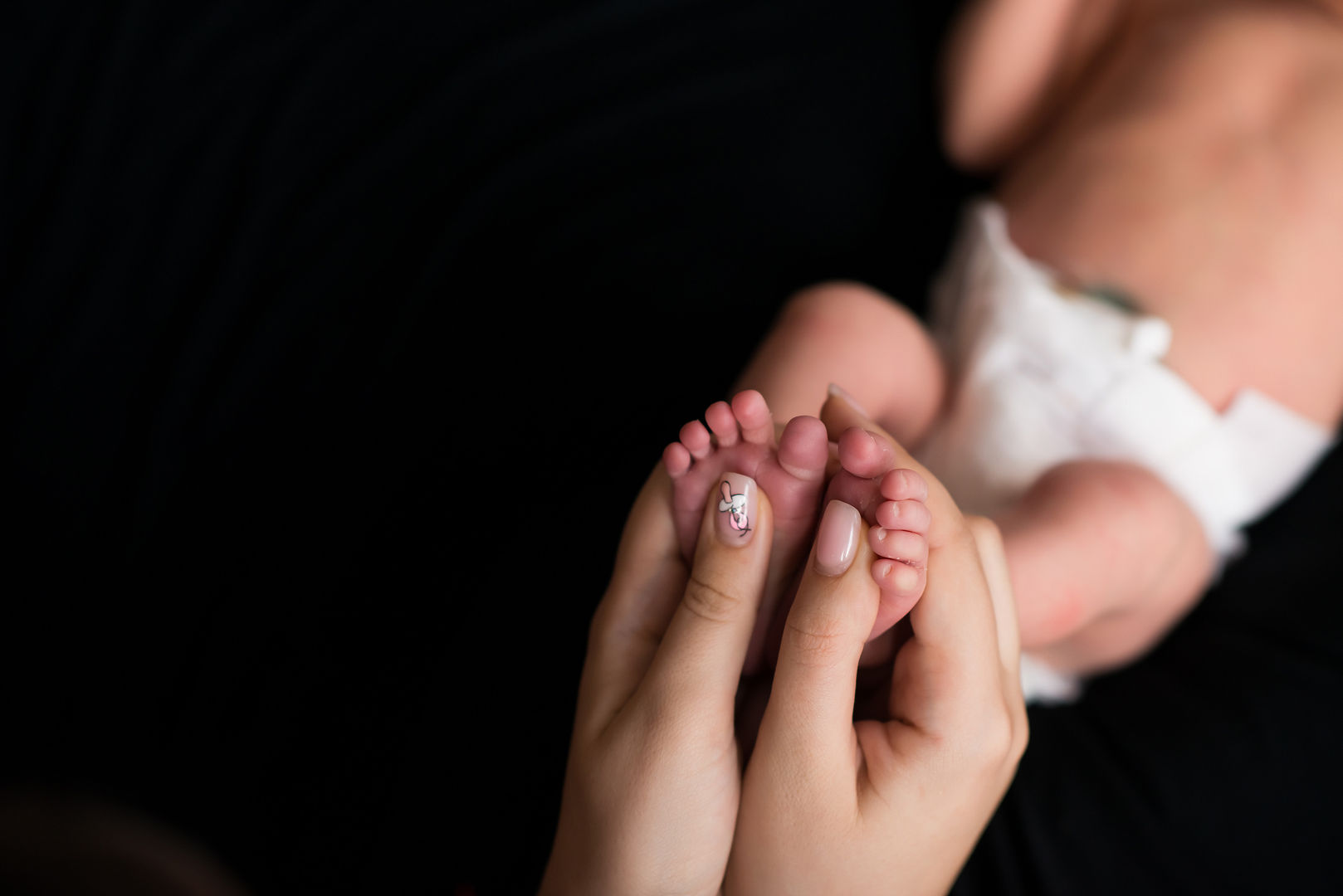 Tender newborn lifestyle family portrait