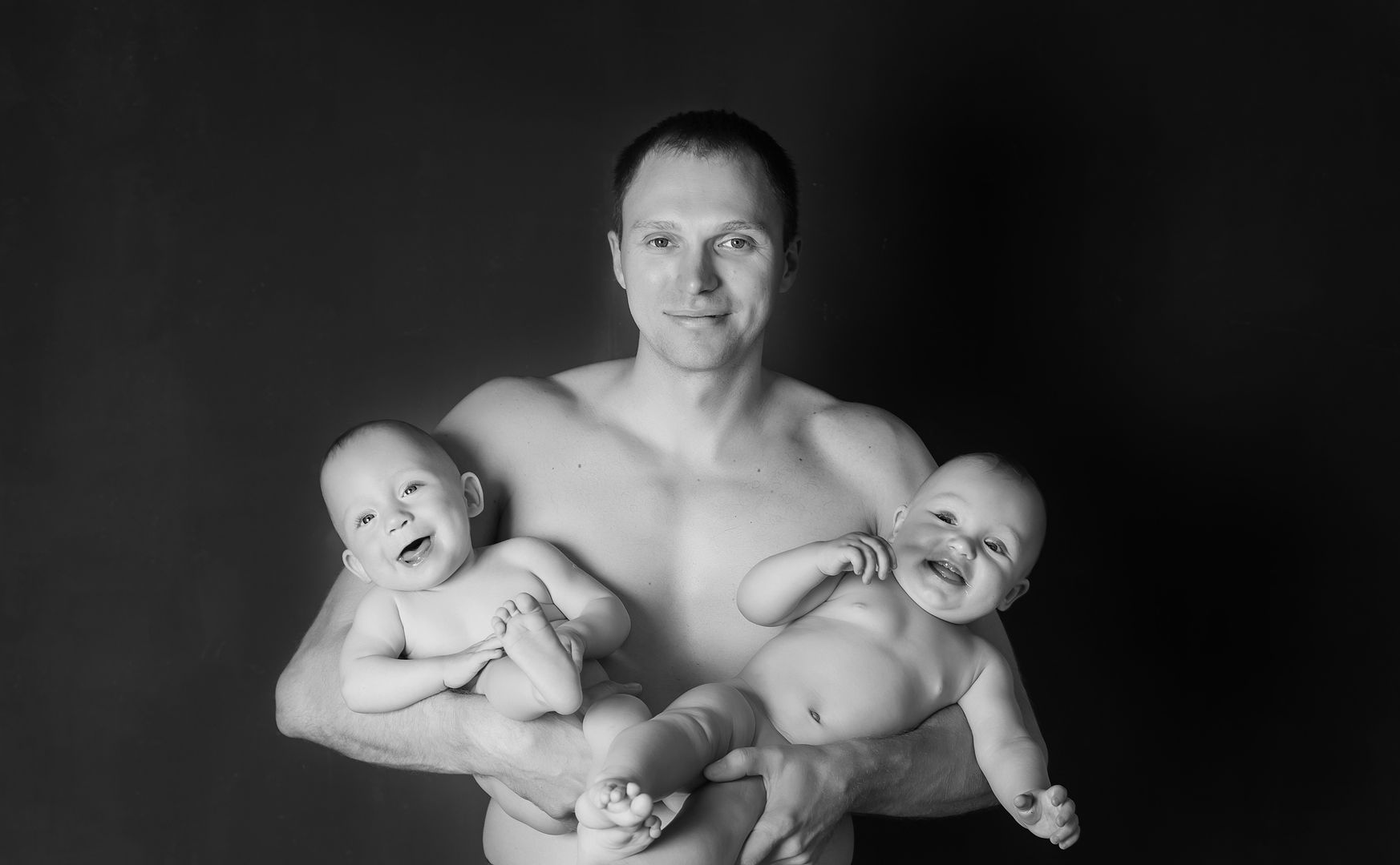 Emotional newborn lifestyle family portrait
