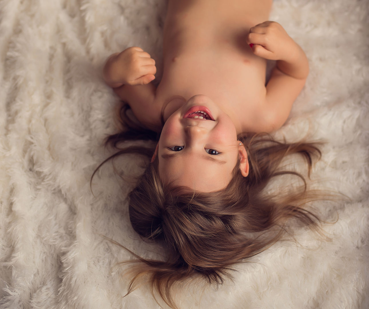 Peaceful newborn resting in lifestyle portrait