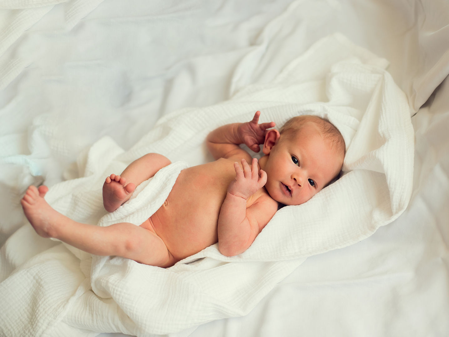 Tender newborn lifestyle photography moment