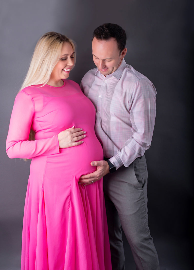 Elegant maternity portrait with creative styling