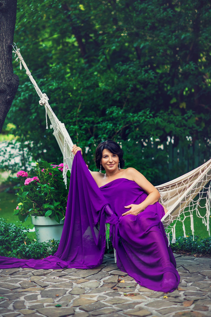 Stunning maternity portrait with graceful posing