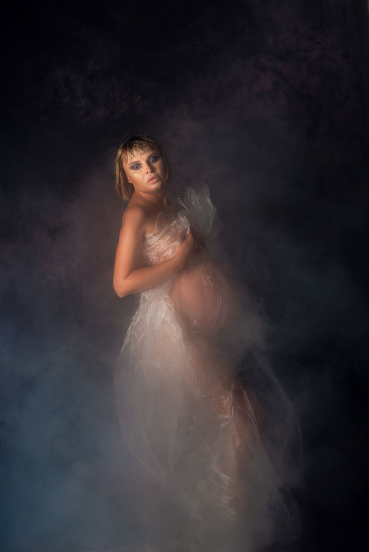 Stunning maternity portrait with ethereal atmosphere