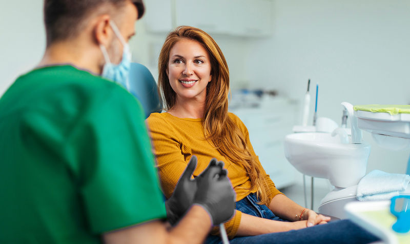 Patient listening to dentist