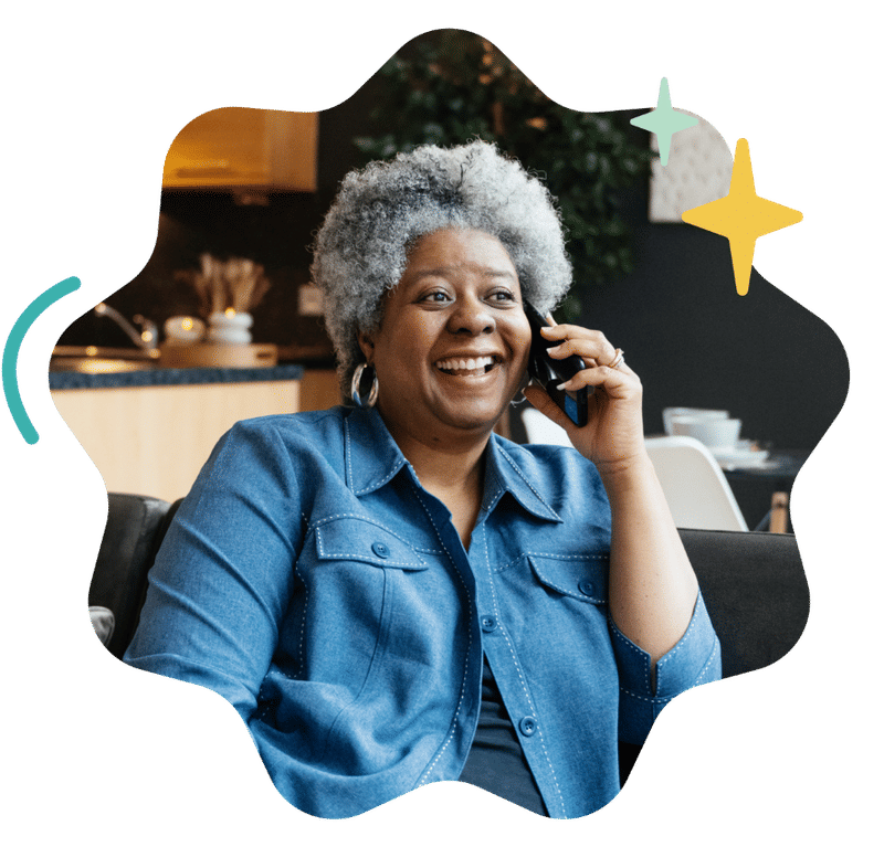 A smiling older woman talking on a cell phone, framed by a wavy black border with decorative star graphics.