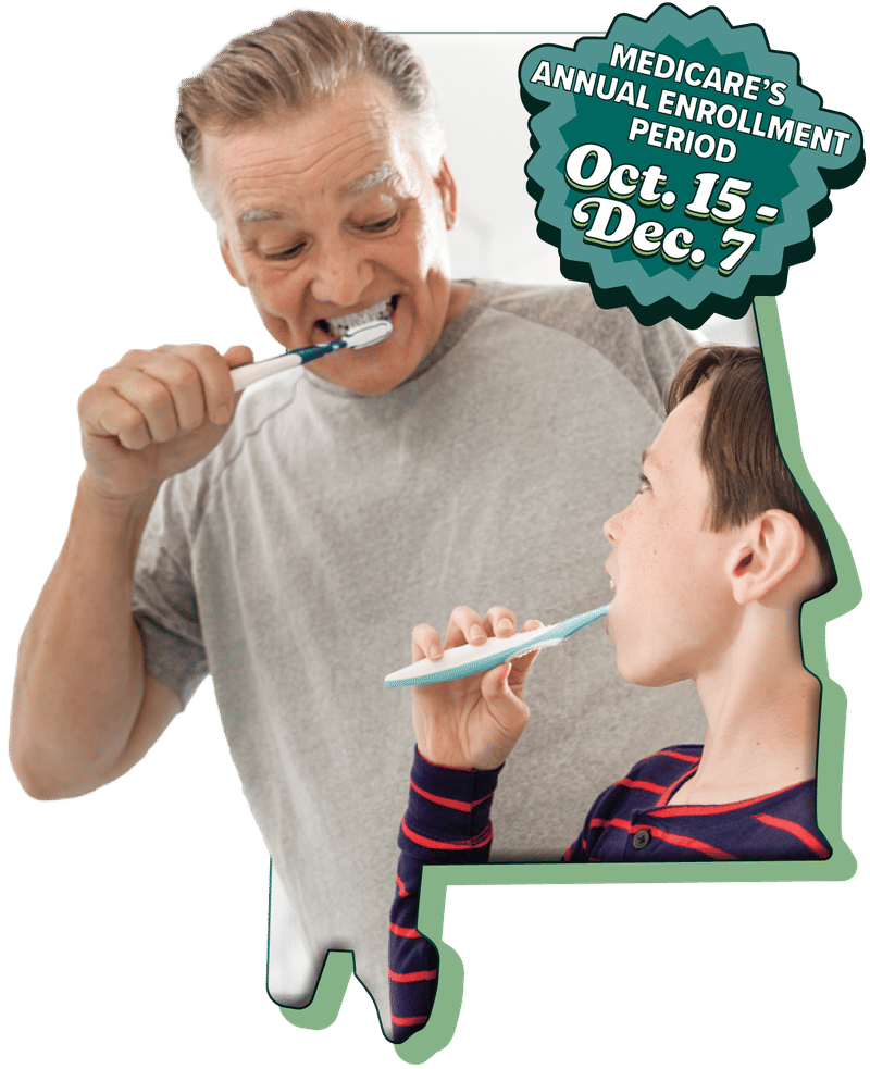 A man and a young boy smiling at each other while brushing their teeth together, framed in the shape of the state of Alabama.
