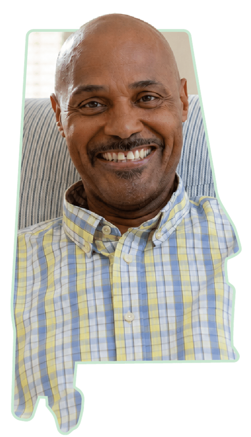 A portrait of a smiling member framed inside the outline of the state of Alabama.