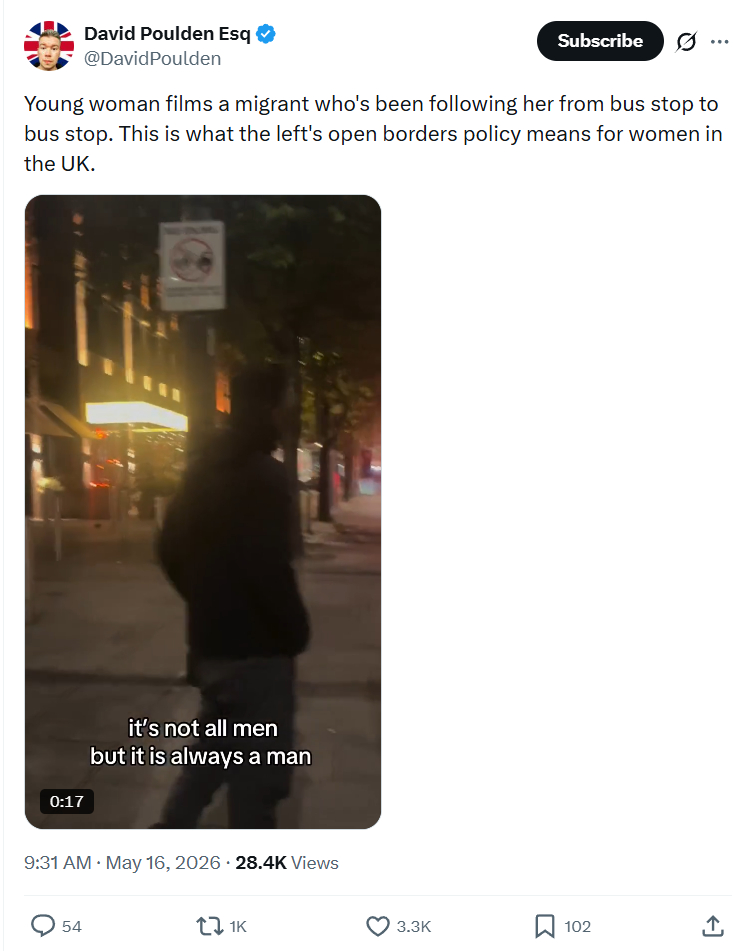 David Poulden: Young woman films a migrant…
