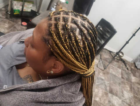 Tina African hair braiding hero image