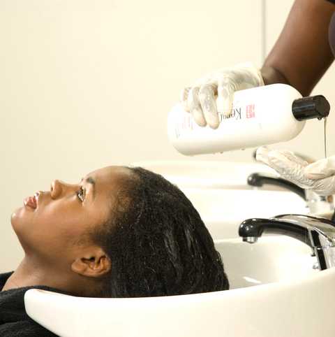 Keratin Complex Express vs Brazilian Blowout longevity comparison at a Greenwood Village hair salon
