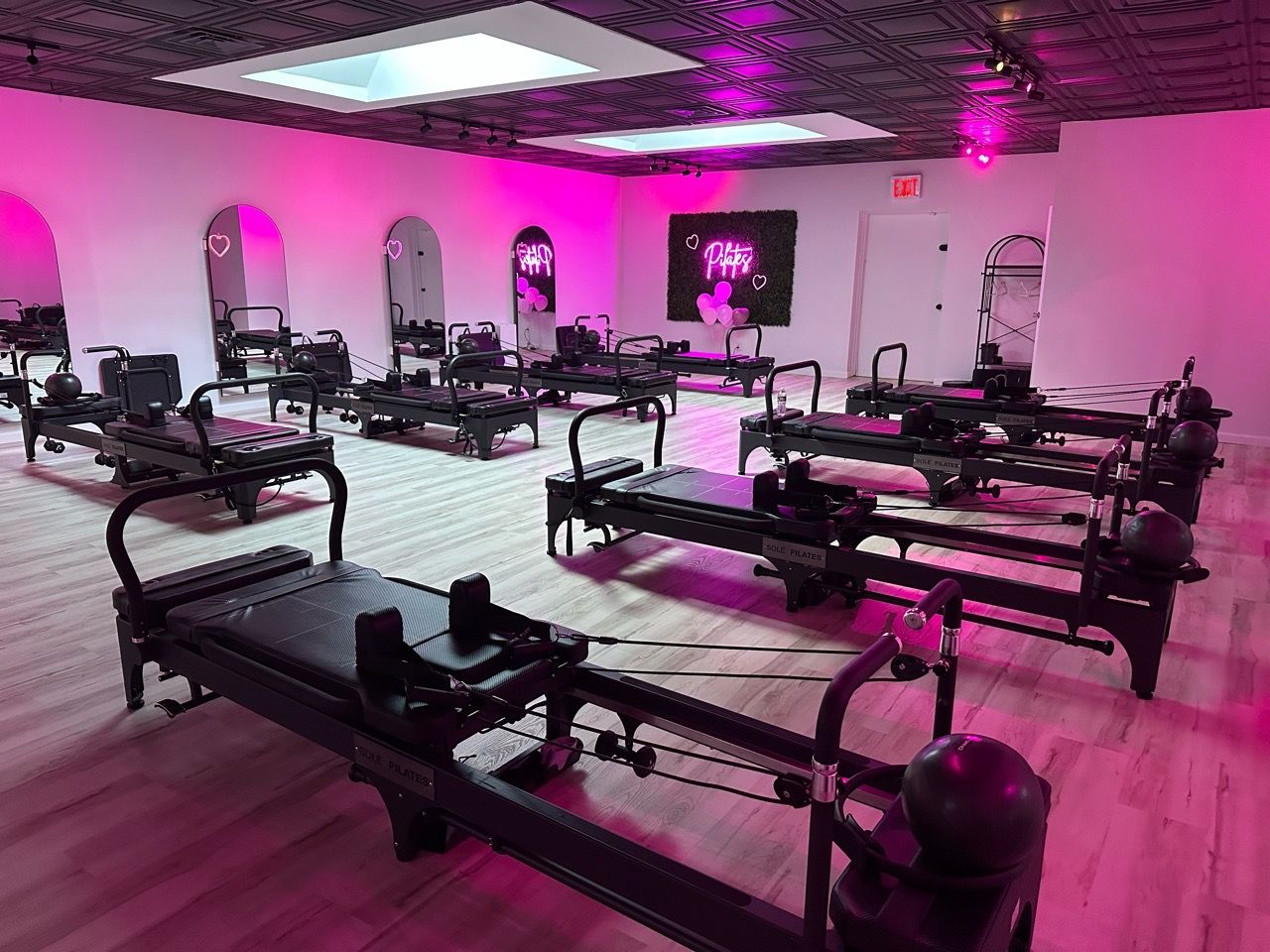  Pilates,studio,fitness,exercise,pink lighting,equipment 