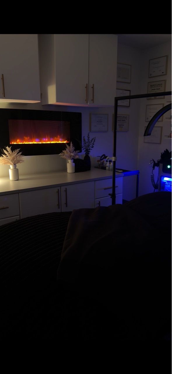  treatment-room,spa-interior,facial-room,wellness,relaxing,professional-space,ambient-lighting,equipment,clean-environment 