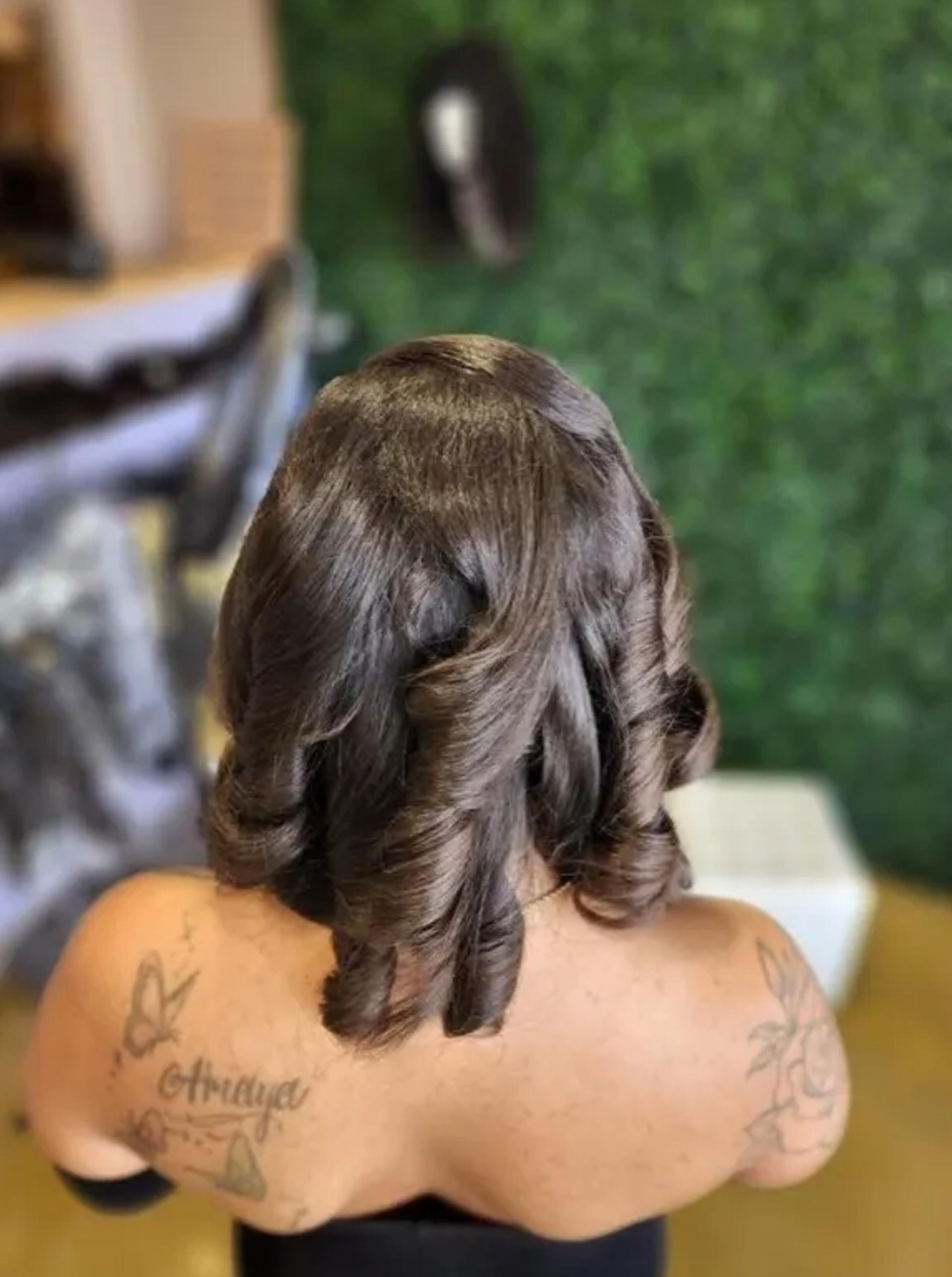 hairstyle,curly-hair,tattoos,back-view