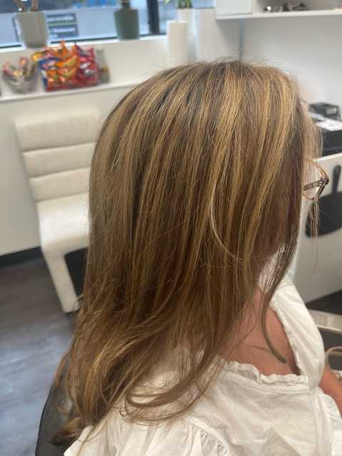 Balayage hair in Vienna VA with soft dimension and face-framing highlights
