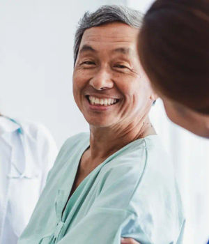 A smiling doctor.