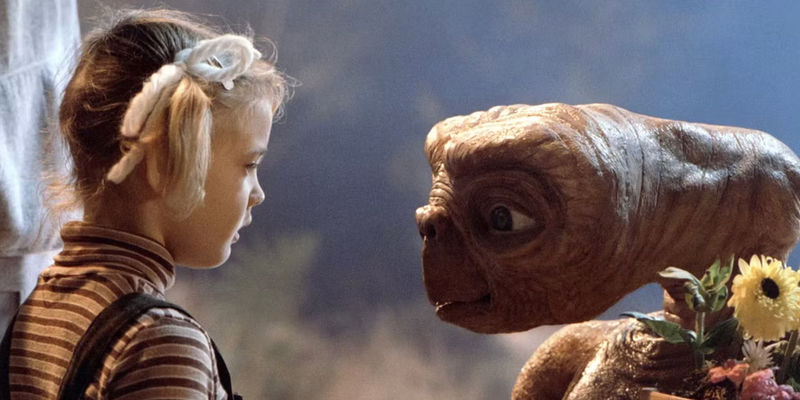 Drew Barrymore looking at ET in ET The Extra-terrestrial