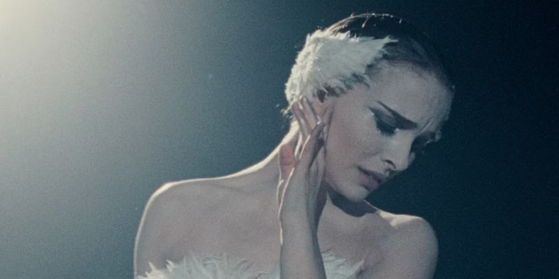 Nina from Black Swan dressed as the white swan looking down