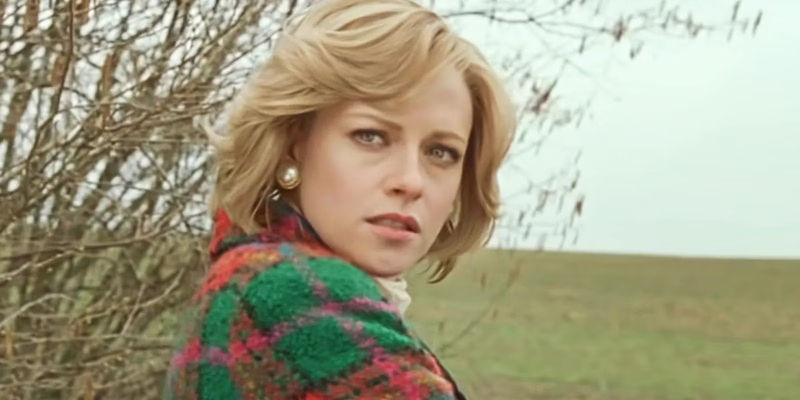 Kristen Stewart as Princess Diana turning around in a field
