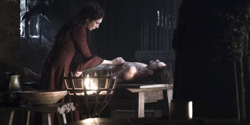 Melisandre performing her resurrection ceremony on Jon Snow in Game of Thrones
