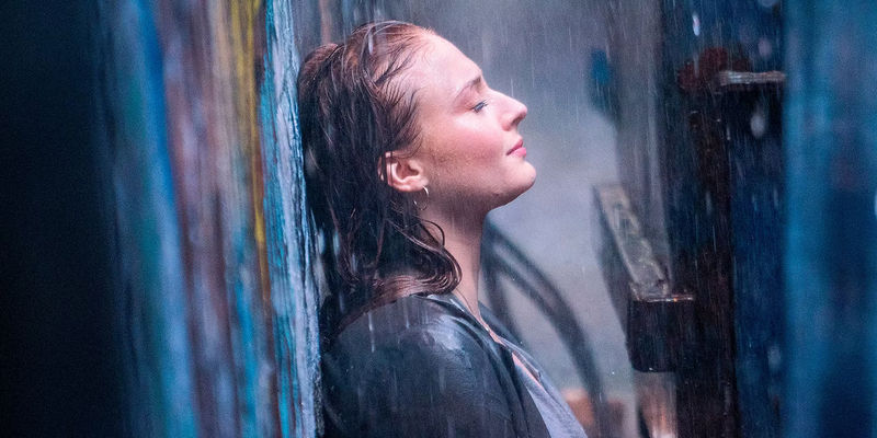 Sophie Turner as Jean Grey in the rain in X-Men Dark Phoenix