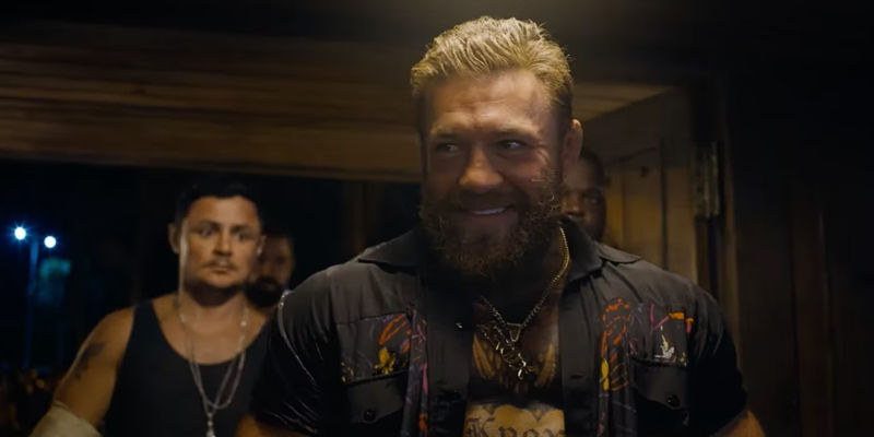 Conor McGregor smiling as Knox in Road House