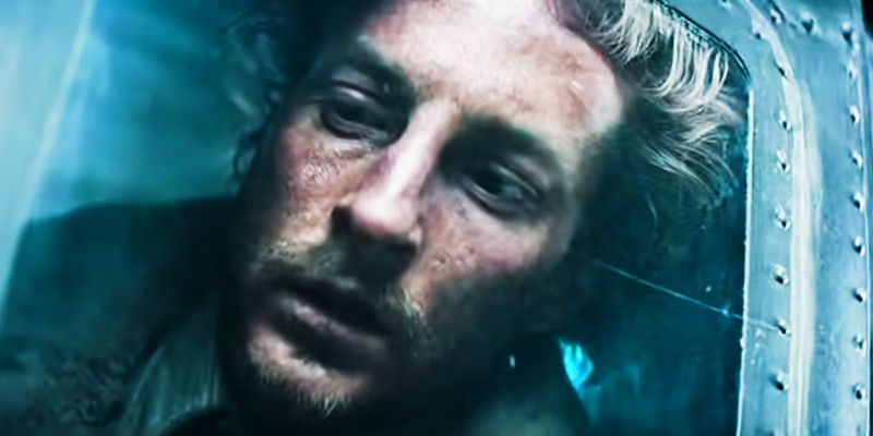 Esteban Kukuriczka as Adolfo Starch looking out of helicopter window in Society of the Snow