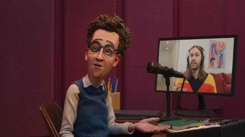 In The Know Lauren talking to Jonathan Van Ness on a monitor.