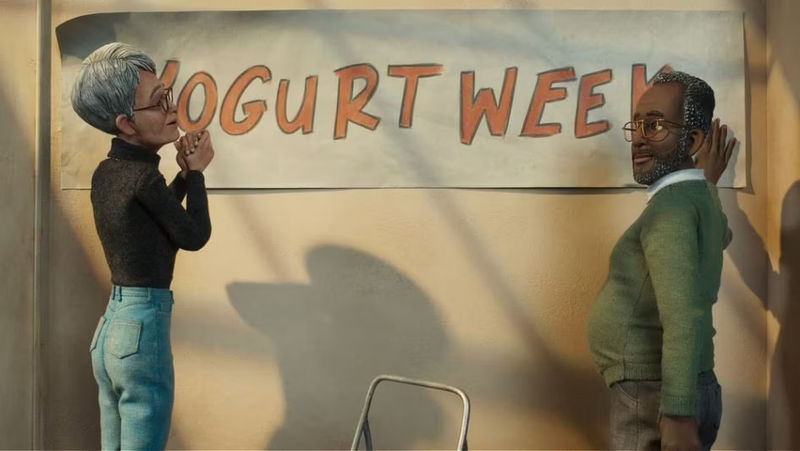 In The Know Barb and Carl putting up a banner that says 