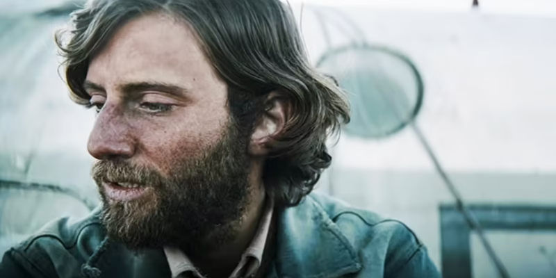 Rafael Federman as Eduardo Strauch looking off to the side in Society of the Snow