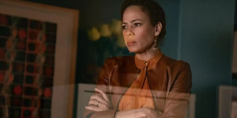 Taissa (Tawny Cypress) with her arms crossed looking nervos and angry in Yellowjackets season 1 episode 6 Saints.