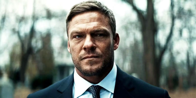 Alan Ritchson looking serious as Jack Reacher in Reacher season 2