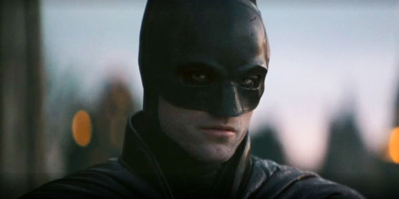 Bruce Wayne in costume at dawn in The Batman